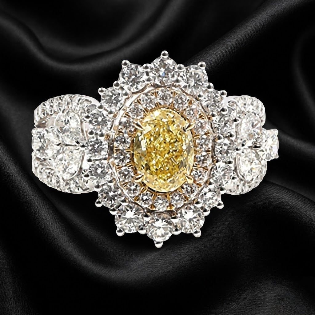 3.00 ct Yellow Oval Diamond Halo Ring with Pear-Shaped Accents and Diamond-Encrusted Band