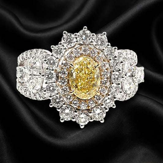 3.00 ct Yellow Oval Diamond Halo Ring with Pear-Shaped Accents and Diamond-Encrusted Band
