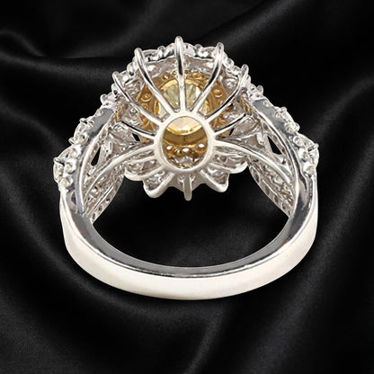 3.00 ct Yellow Oval Diamond Halo Ring with Pear-Shaped Accents and Diamond-Encrusted Band