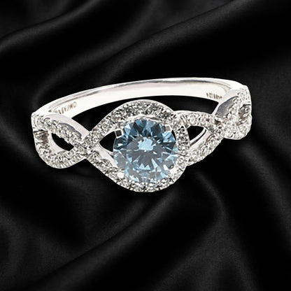0.70 ct Blue Brilliant-Cut Diamond Ring with Twisted Band and Diamond Halo