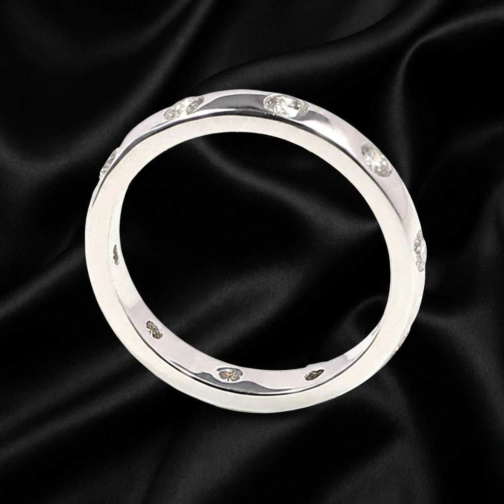White Gold Band with 0.80 ct Round Cut Diamonds in Flush Setting
