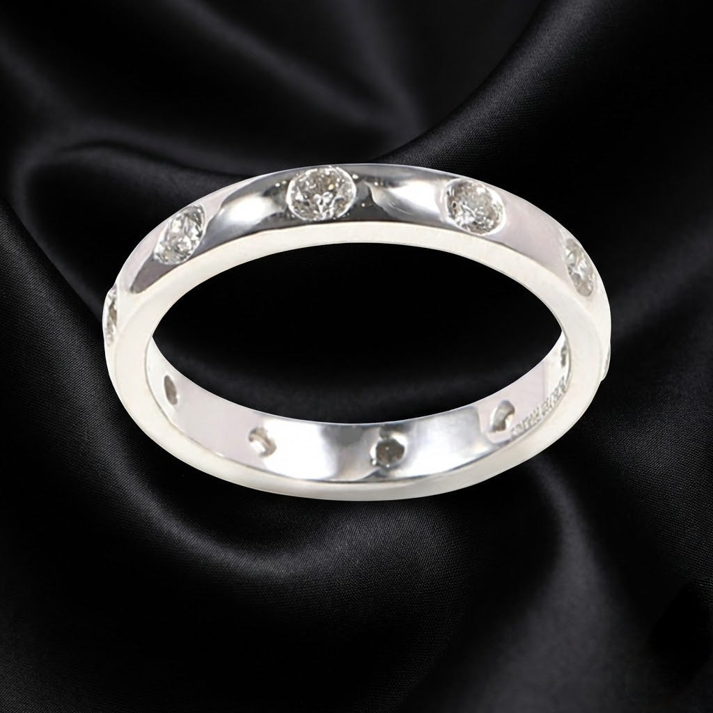 White Gold Band with 0.80 ct Round Cut Diamonds in Flush Setting