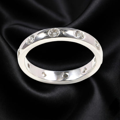 White Gold Band with 0.80 ct Round Cut Diamonds in Flush Setting
